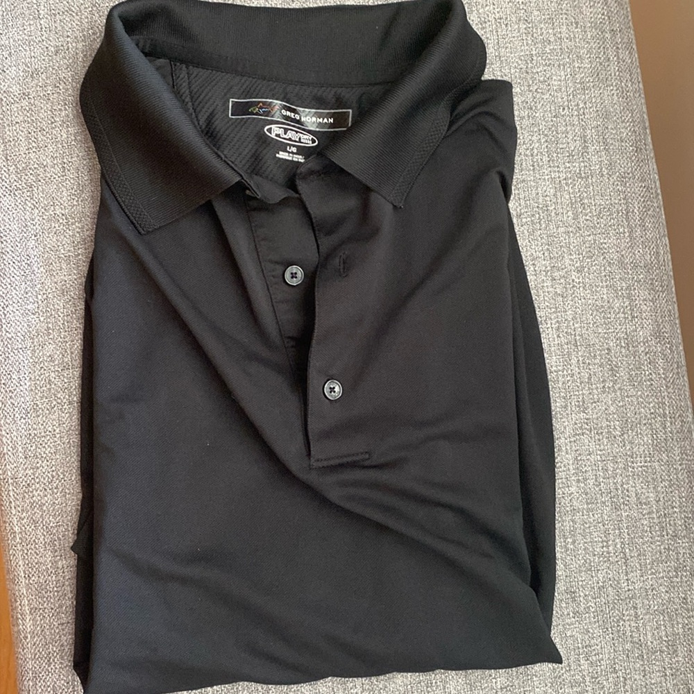 Greg Norman sz L EUC golf/ polo shirt. 100% Polyester in black. Play Dry style